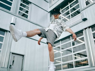 Person doing a balancing pose on one leg